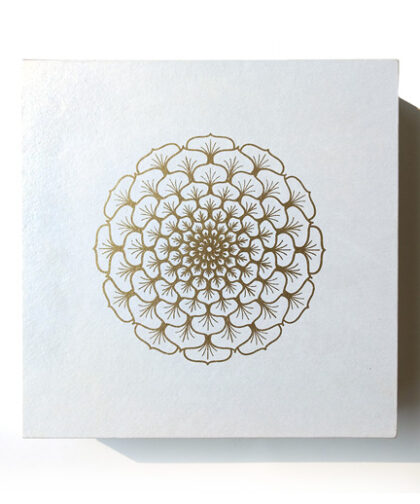 White square box with golden mandala screen printed on top